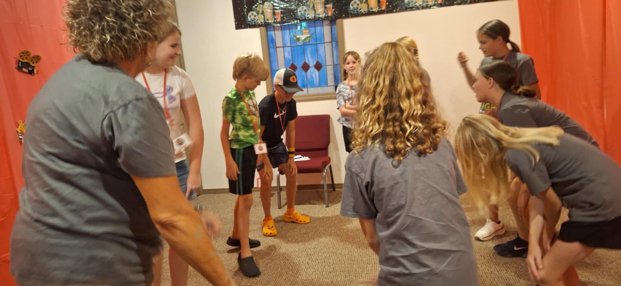 Children and adults participating in a group activity at Beacon Baptist Church